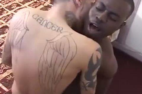 Tattooed White lad gets poked By ebony man