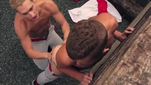 Two Baseball boys banging Each Other